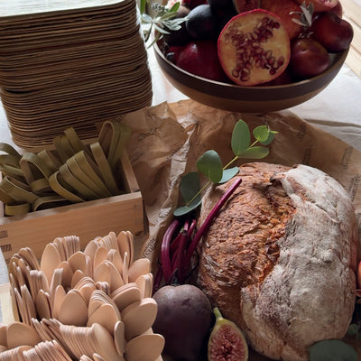 Wooden cutlery set for guests set for catering event at a Cambridge May Ball