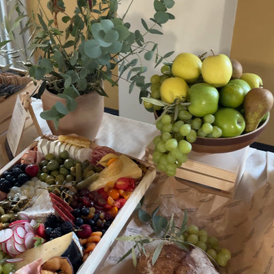 Close-up of charcuterie board with pickles, cheeses, fruit and cured meats for Cambridge corporate event
